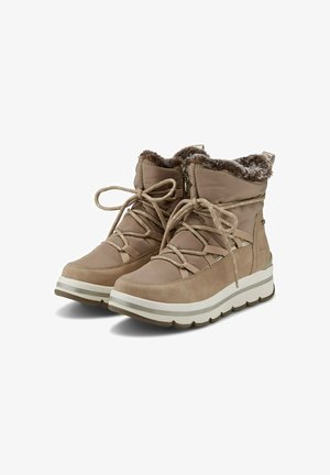 Beige ankle boots with faux fur lining, lace-up design, and side zipper. Features a chunky white outsole with light gray stripes.