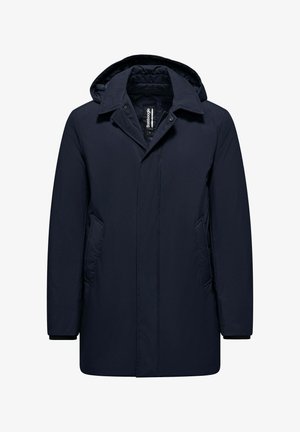 Parka impermeabile blu navy con cappuccio, dotata di chiusura con zip e bottoni a pressione, due tasche frontali e fodera interna trapuntata.