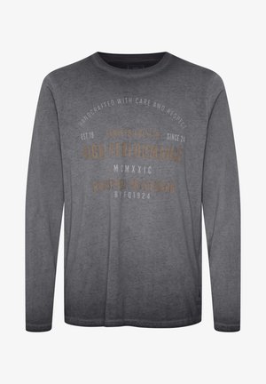 Pitkähihaisen harmaan T-paidan pehmeä kangas, jossa on vaihtelevaa typografiaa valkoisena ja metallinhohtoisena kultana, pyöreä pääntie ja ommeltu helma.