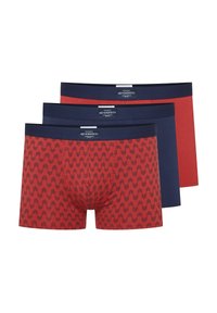 Three pairs of men's boxer shorts: one with a red geometric pattern, one solid red, and one solid navy, all with elastic waistbands.