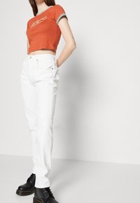 Levi's® T-shirt med print - orange