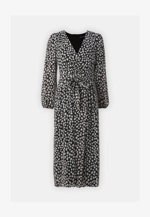 Schwarzes Kleid mit V-Ausschnitt und langen, puffärmeligen Ärmeln. Der Stoff hat ein graues Punktmuster und einen Bindegürtel in der Taille.