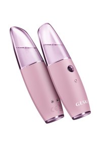 Deux appareils de brumisation portables en plastique rose clair avec des dessus transparents. Ils présentent un bouton et de petites voyants lumineux sur le corps.