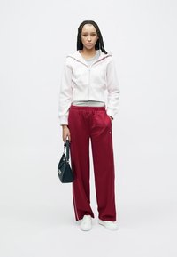 Tommy Jeans ARCHIVE TRACK PANT - Trainingsbroek - lavish cerise