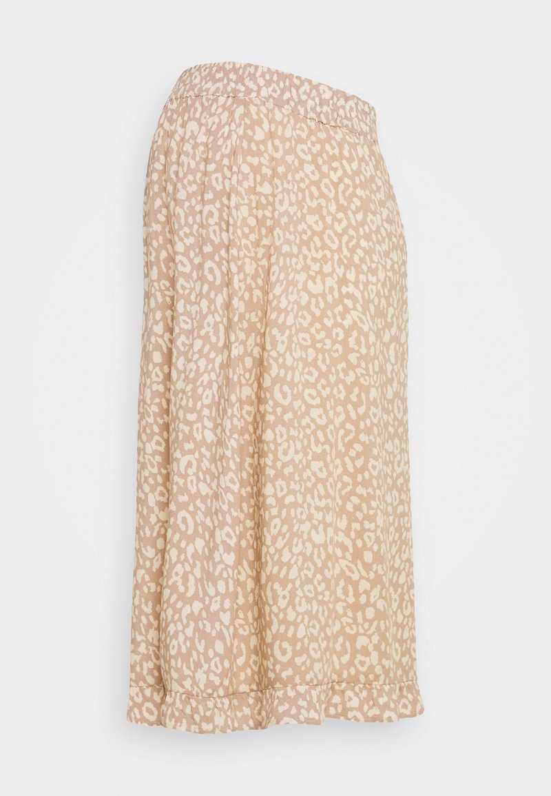 Béžová sukně s měkkou texturou, zdobená leopardským vzorem v off-white. Elastický pás a splývavý design s detaily na lemu.