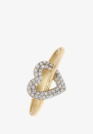 Anneau en or en forme de cœur, orné de cristaux ronds et clairs le long des bords, avec un accent de ligne centrale. Fini lisse et poli.