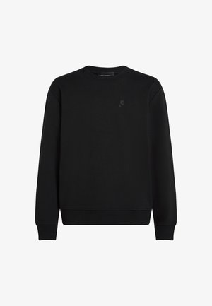 Czarny sweter crewneck wykonany z miękkiej tkaniny. Posiada ściągacze na mankietach i u dołu, z małym, tonalnym logo na klatce piersiowej. Prosty design.
