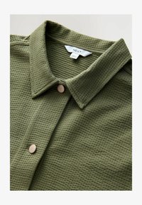 Sélectionné, khaki camo