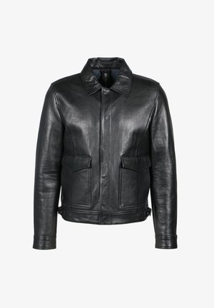 Schwarze Lederjacke mit Kragen, ausgestattet mit zwei vorderen Klappentaschen und einer glatten Textur. Einfaches Design mit dezenten Nähten.