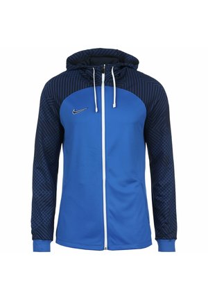 Sweat à capuche Nike bleu avec fermeture éclair complète, manches et capuche à motifs géométriques bleu foncé, fermeture éclair blanche et cordons blancs.
