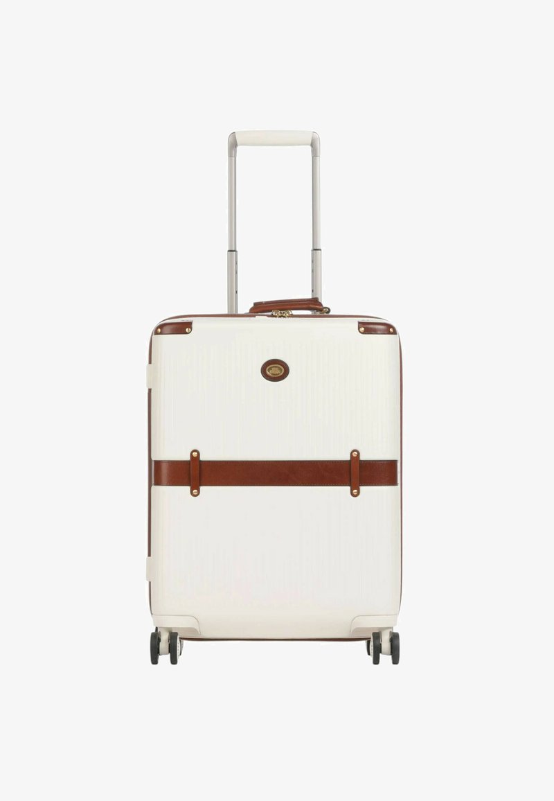 Valigia rigida bianca con dettagli in pelle beige e manico retrattile. Presenta ruote nere e una superficie testurizzata. Design durevole e funzionale.