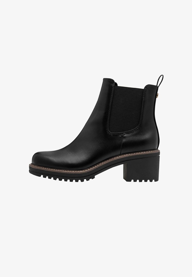 Bottine noire en cuir avec empiècement latéral élastique, semelle rainurée, talon bloc et languette à l'arrière.