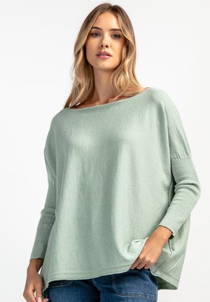 - Sweter