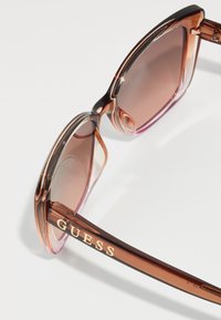 Guess UNISEX beżowy