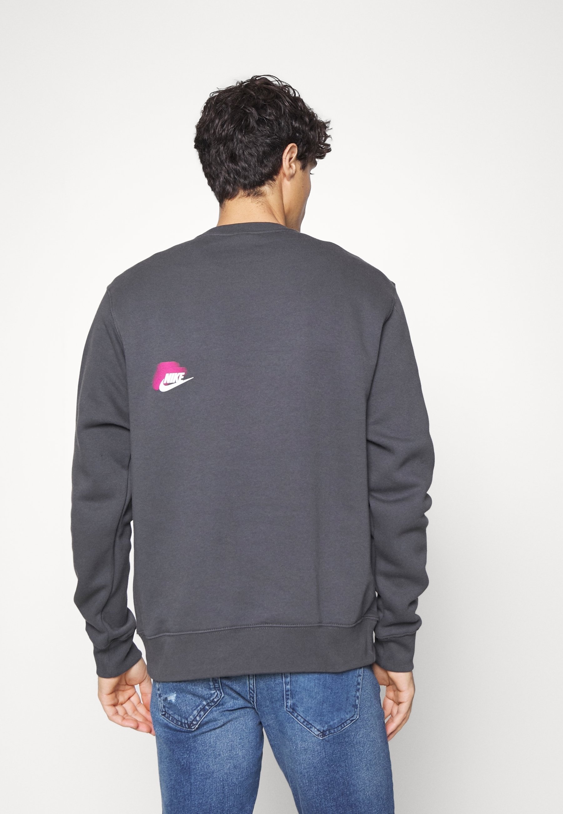 grey nike jumper with ticks all over