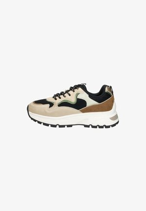 Beige and black sneaker with mesh and suede materials, featuring green and brown accents, thick white midsole, and textured black outsole.