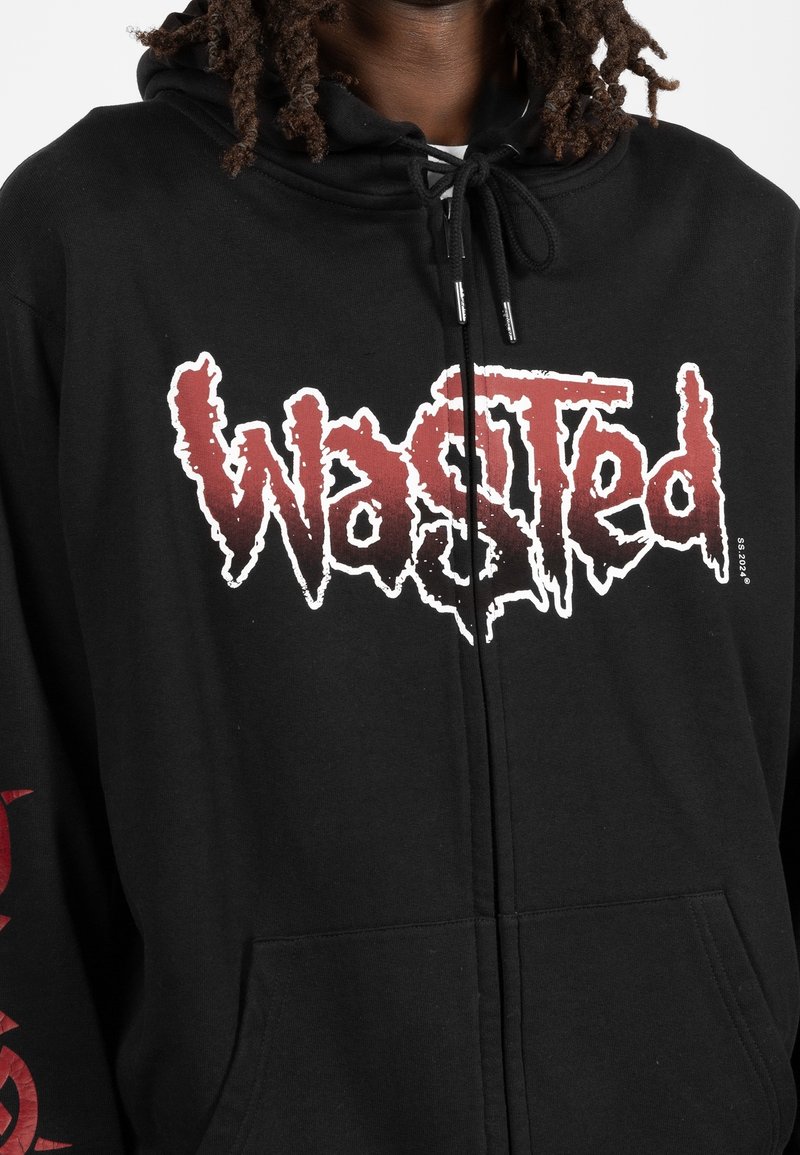 Black zip-up hoodie made of cotton, featuring a white and red graphic logo "Wasted" on the front and a kangaroo pocket.