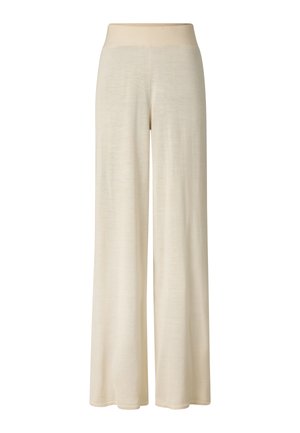 Beige Hosen mit weitem Bein, elastischem Bund, weichem Stoff und entspannter Passform.