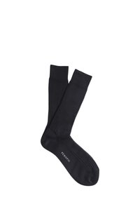 Calze nere a coste, realizzate in materiale morbido e di colore uniforme. Presentano una punta liscia e un bordo elasticizzato. Nome del marchio stampato sulla suola.