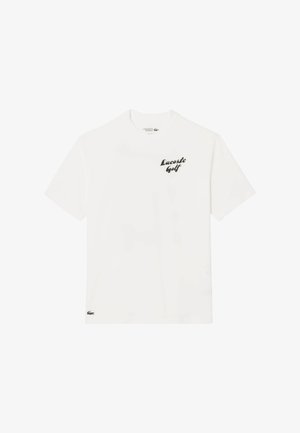 Witte katoenen t-shirt met korte mouwen, voorzien van een zwart "Lacoste Golf" logo op de borst en een groen krokodillensymbool op de zoom.