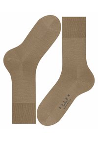 Beige Baumwollsocken mit glatter Textur, ausgestattet mit einem gerippten Bündchen und verstärkter Zehenpartie. Der Etikettentext auf der Sohle gibt Marke und Modell an.