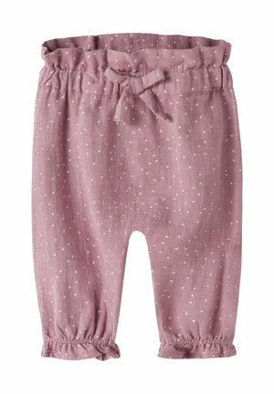 Pantalon bébé rose avec des pois blancs, taille élastique avec un nœud, et poignets froncés aux chevilles.