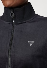 Guess COUTURE FULL ZIP  - Jaka ar rāvējslēdzēju - jet black