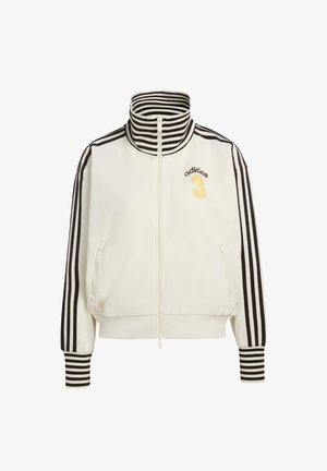 Bílá bunda na zip s vysokým límcem, černé pruhované detaily na rukávech a límci, s číslem 3 a zlatým logem "adidas".
