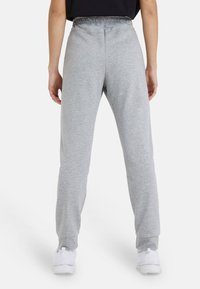 Arena UNISEX - Jogginghose - grau