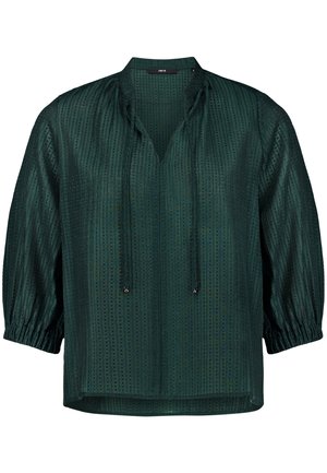 Blouse semi-transparente vert foncé avec des rayures texturées verticales, des manches bouffantes trois-quarts, un col en V avec liens et des poignets élastiqués.