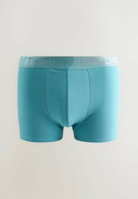 Boxer shorts in cotone blu con una vita grigia che presenta il marchio "NEXT" in rilievo, texture liscia e design aderente.