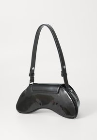 Black patent leather handbag with a curved, semi-oval shape, adjustable strap, and a smooth, reflective surface. No visible hardware details.