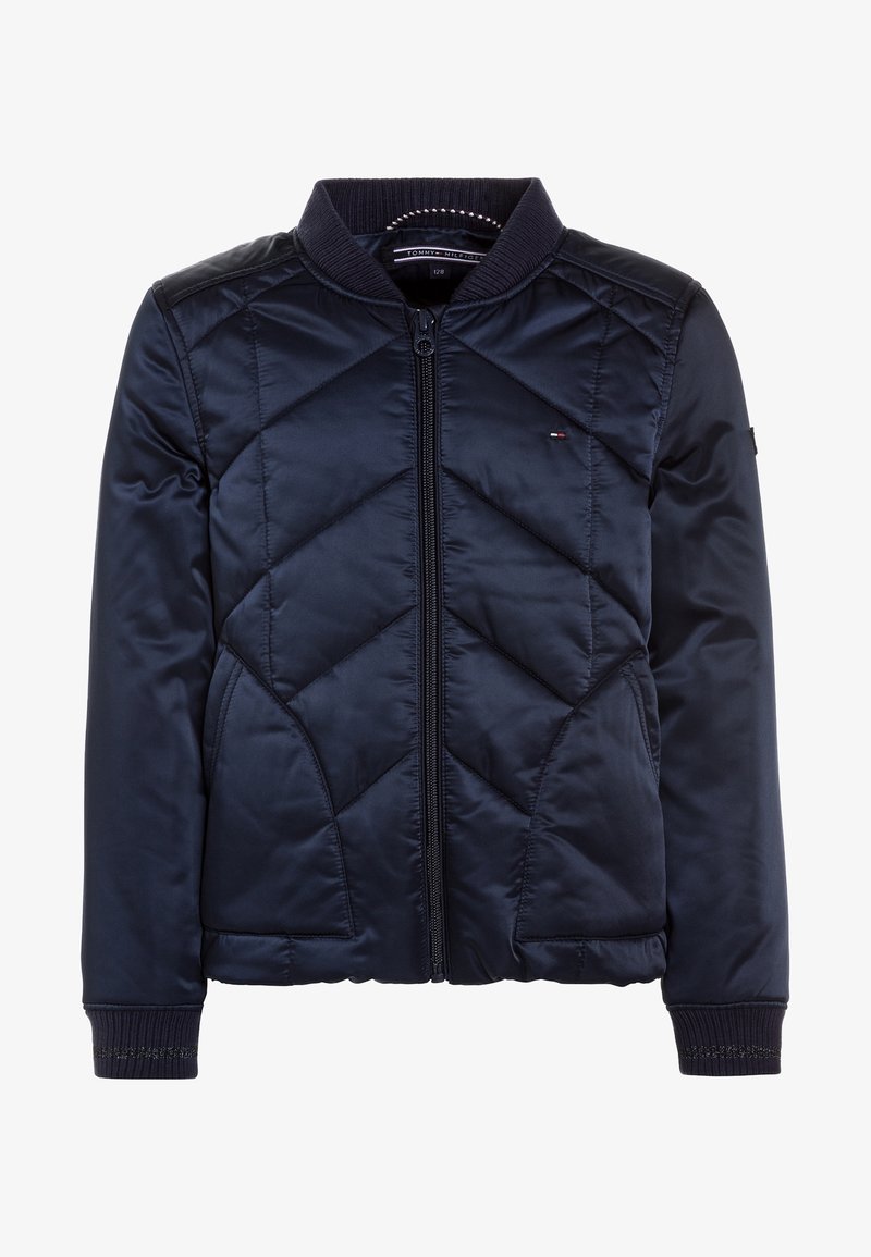 Veste bomber matelassée bleu marine avec fermeture éclair, col et poignets côtelés, poches latérales et petit logo Tommy Hilfiger sur la poitrine.