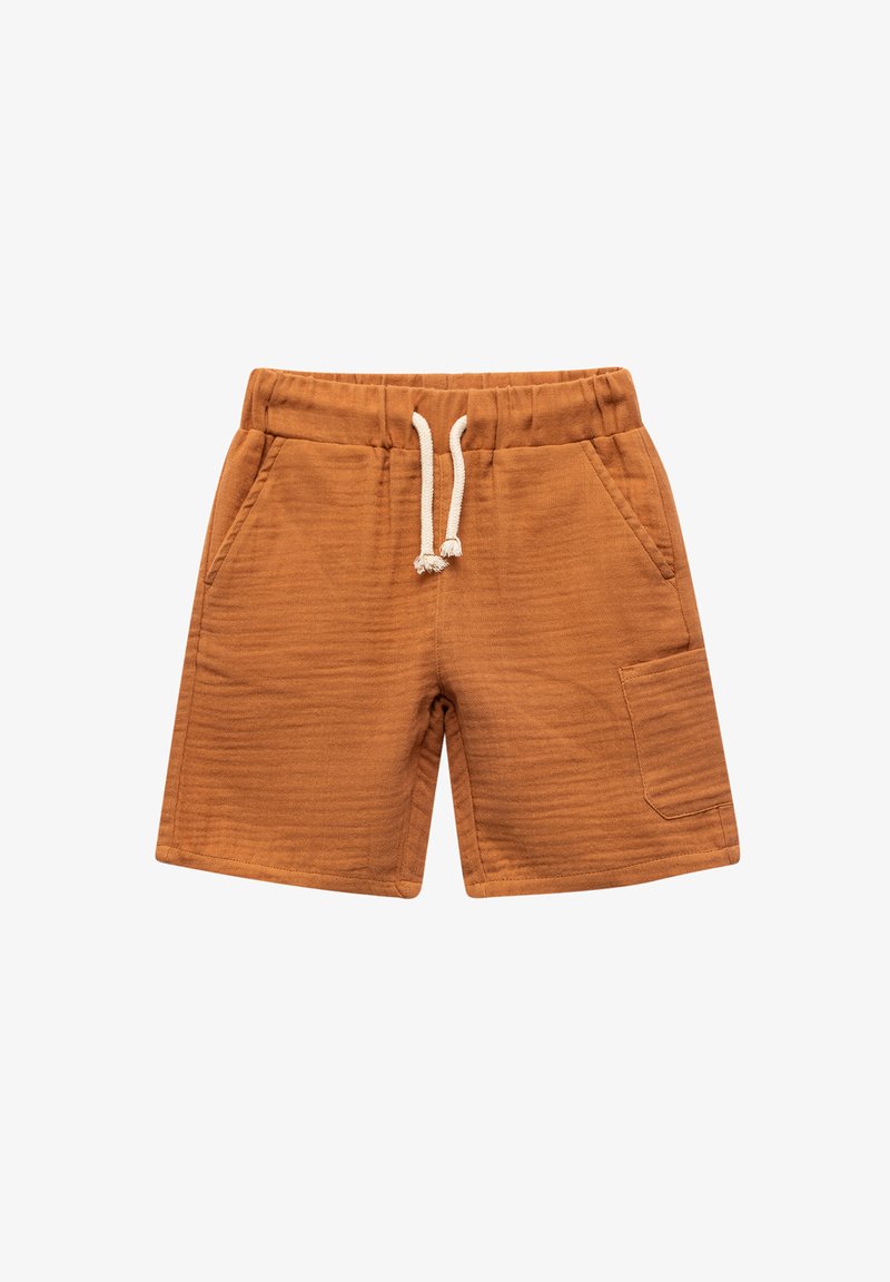 Housut vaaleanruskeasta kankaasta, joissa on joustava vyötärö ja valkoinen naru. Ominaisuuksia ovat kaksi sivutaskua ja yksi päällystasku reisessä.