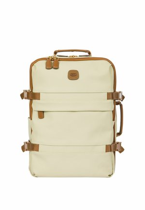 Zaino rettangolare colore crema con rifiniture in pelle marrone, chiusura con doppia cerniera, due cinturini laterali e manico superiore.