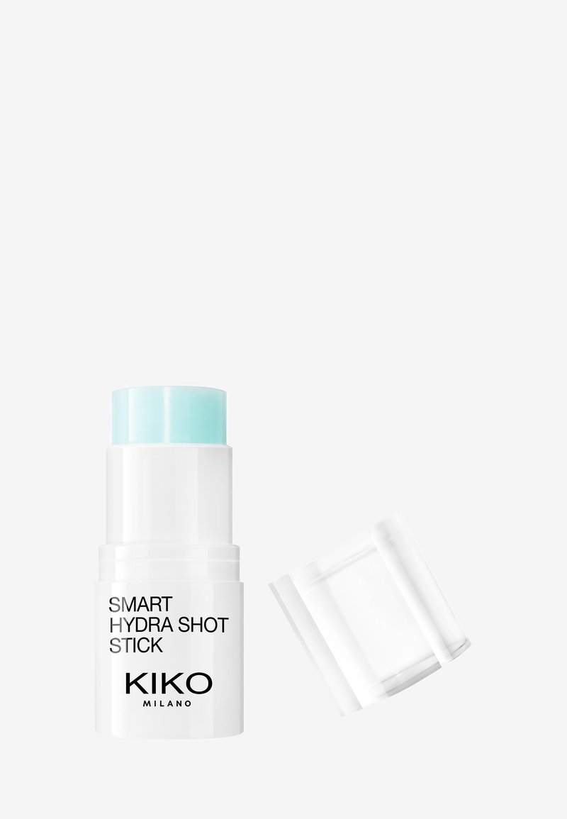 Bâtonnet blanc avec un capuchon bleu clair, étiqueté "Smart Hydra Shot Stick", présentant un mécanisme transparent à vis et un design minimaliste.
