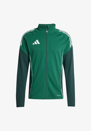 Veste de sport zippée verte avec des rayures blanches sur les épaules et les côtés. Fabriquée en tissu doux avec une texture lisse, elle présente un col montant.