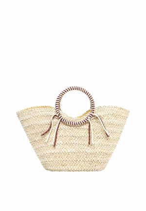 Borsa tote di paglia intrecciata con apertura ampia, manici circolari avvolti e cordoncini decorativi annodati in toni beige e marroni.