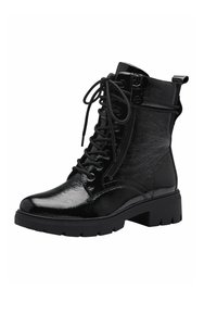 Black ankle boot made of shiny patent leather, featuring a lace-up front, side zipper, and thick rubber sole with ridged texture.