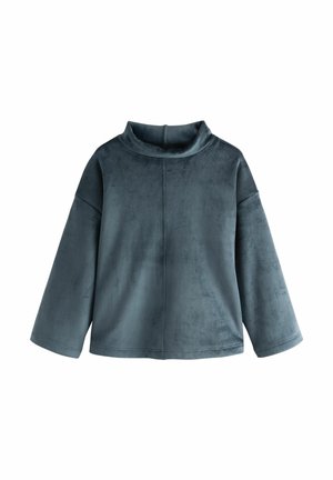 Pull-over en velours bleu gris foncé à manches longues, coupe ample avec col légèrement relevé sur fond blanc.