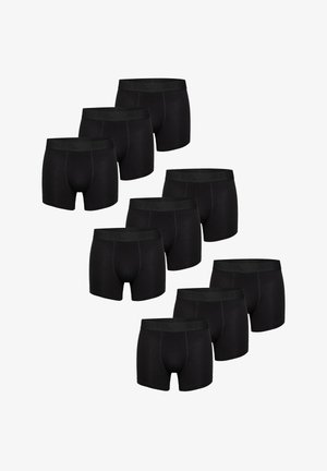 Boxer conci neri in cotone, caratterizzati da una vita morbida, una texture liscia e un design aderente. Set di dieci, colore e stile uniformi.