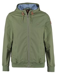 Veste à capuche verte en tissu léger avec fermeture éclair frontale, poignets élastiques et détails à cordon de serrage. La doublure intérieure présente un motif bleu.