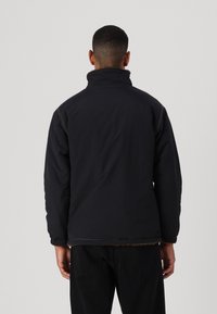 Billabong GNARALOO JACKET - Parca - stealth
