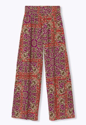 Pantalon à jambes larges avec un motif floral et géométrique multicolore en violet, rouge, marron et beige sur fond blanc.