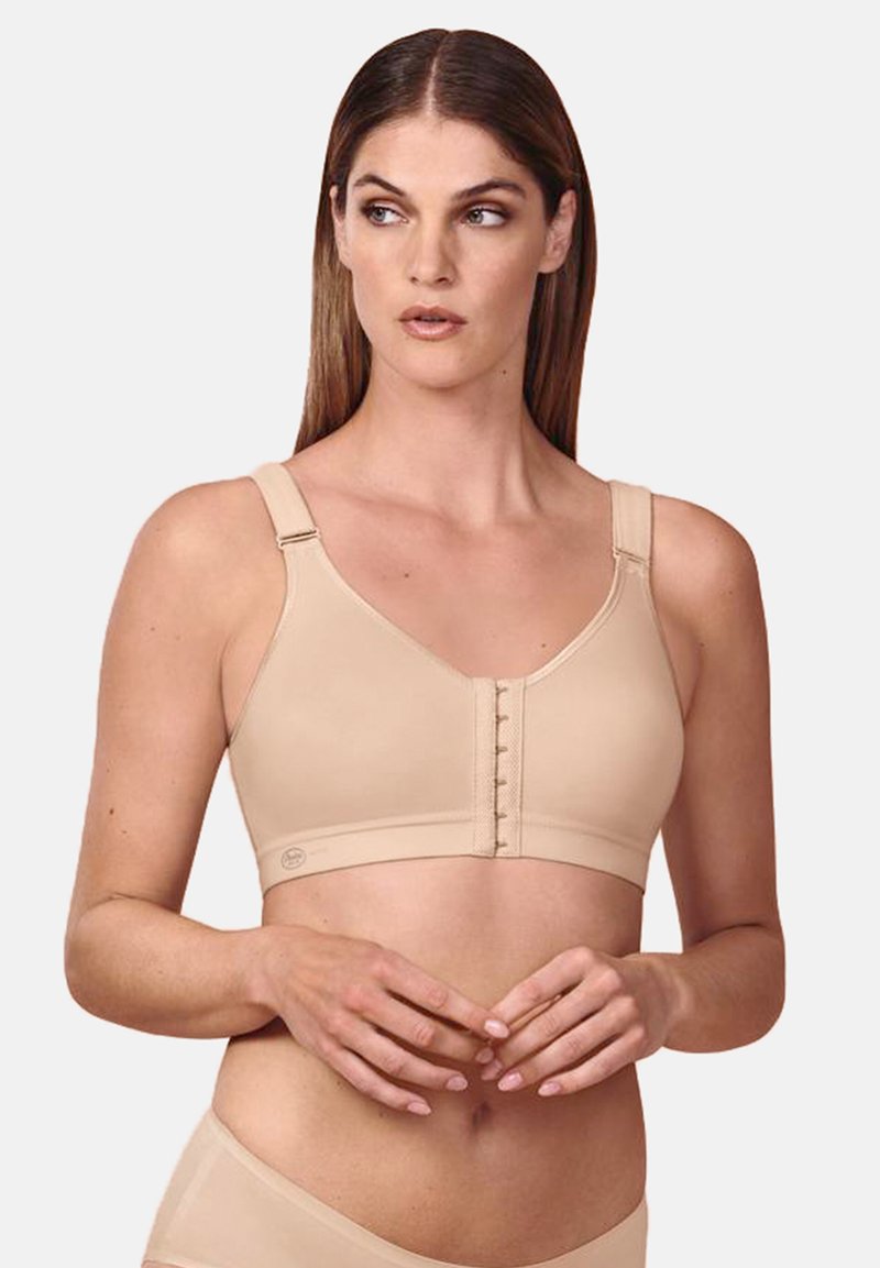 Beige Softcup-BH mit breiten Trägern, Frontverschluss, glatter Textur und nahtlosem Design. Mit leichter Polsterung für zusätzlichen Komfort.