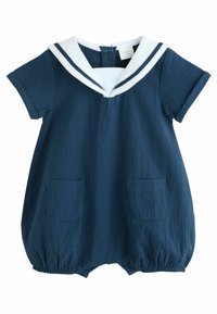 Marineblauwe romper met korte mouwen, een witte zeilercollor en twee vo pockets. Gemaakt van gestructureerde stof, met elastiek bij de benen.