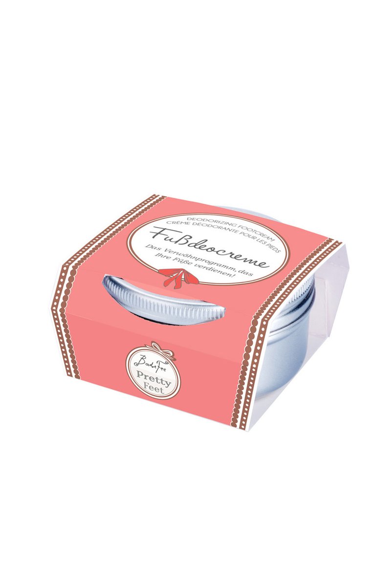 Deodorizing foot cream in a clear plastic container with a silver lid, encased in a pink box featuring white accents and text.