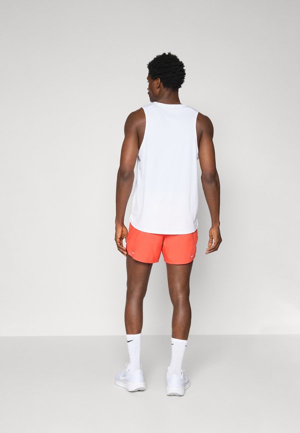 CITY MARATHON STRIDE SHORT - Sports shorts - light crimson2