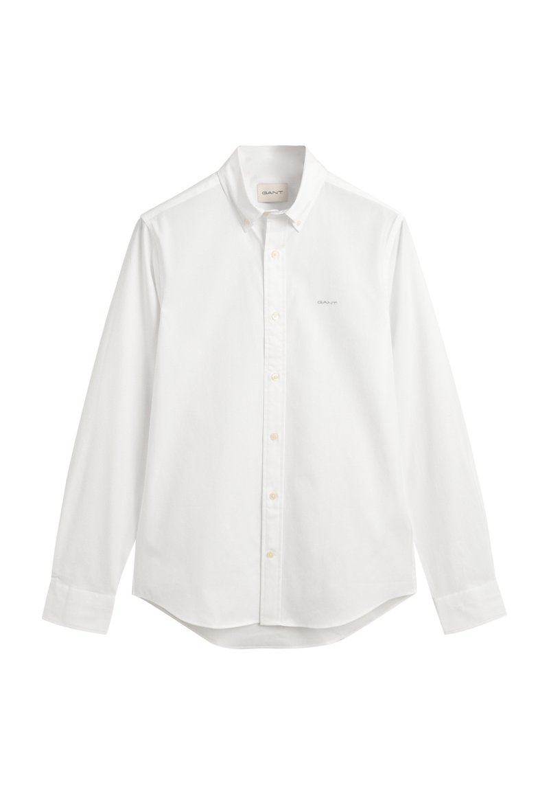 Chemise blanche à boutons en coton, avec un col écarté, des manches longues et un logo discret sur la poitrine gauche. Design à coupe classique.