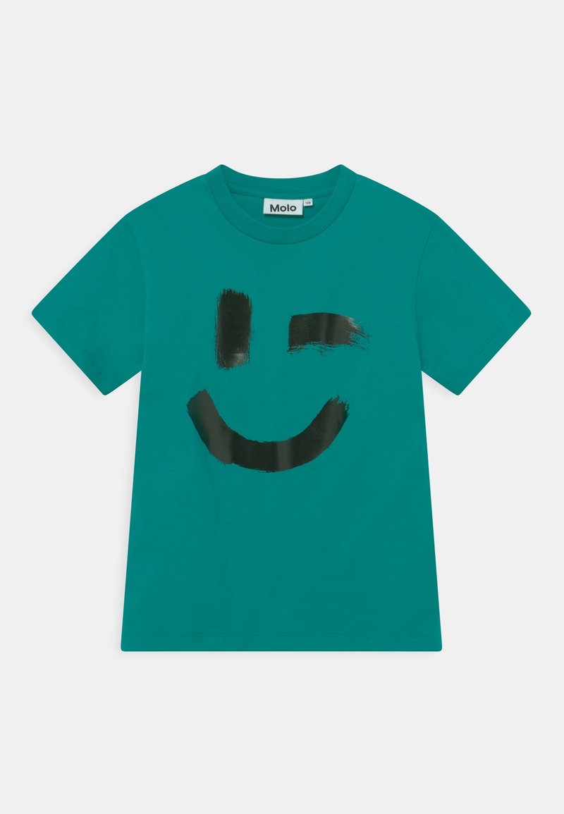 Camiseta de algodón turquesa con un gráfico de una gran sonrisa de cara feliz en trazo negro. Mangas cortas y cuello redondo.